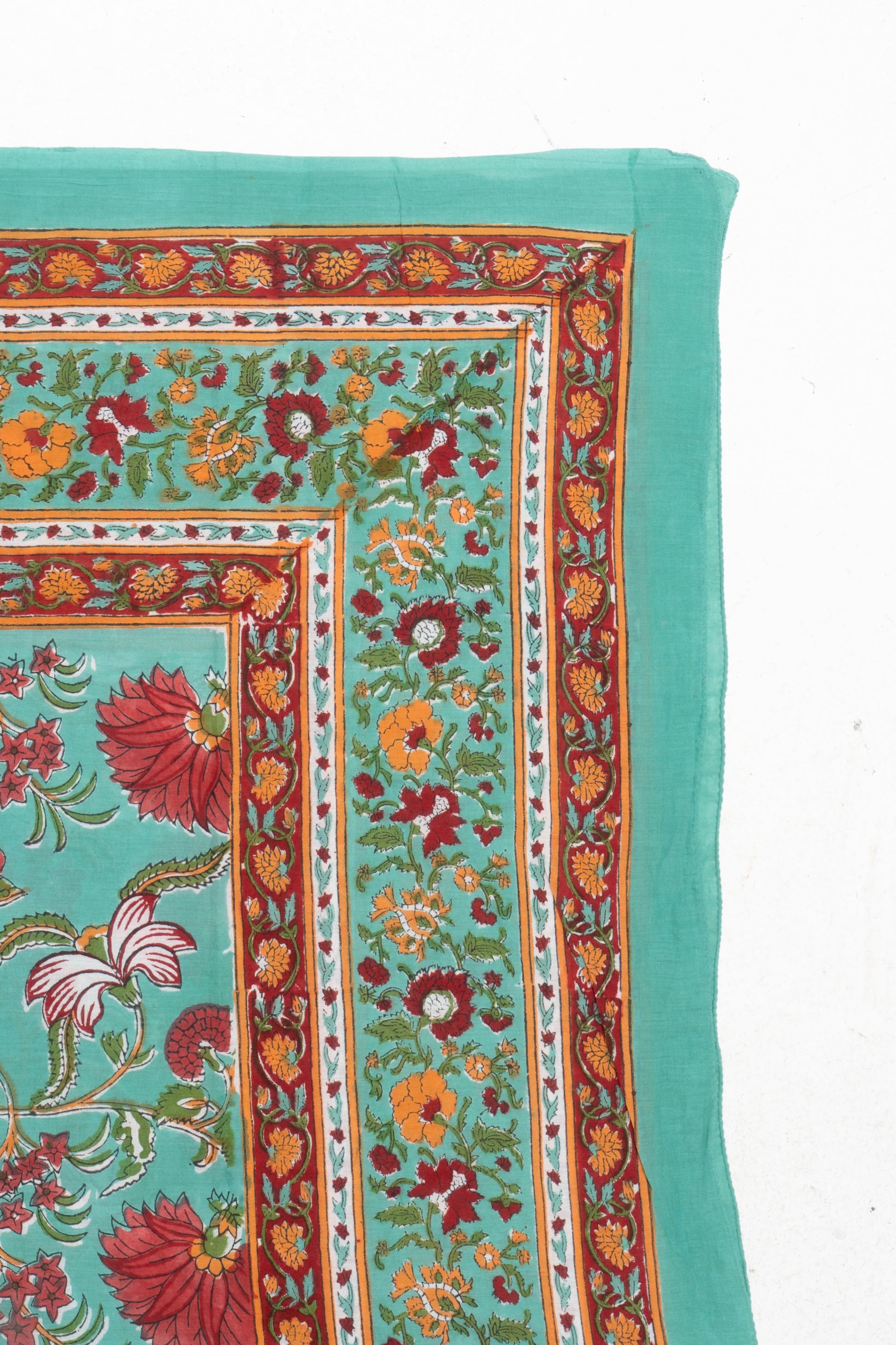 Pareo toni smeraldo e rubino.