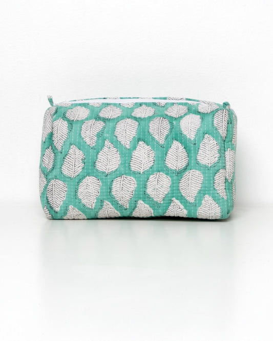Trousse verde menta con foglie bianche