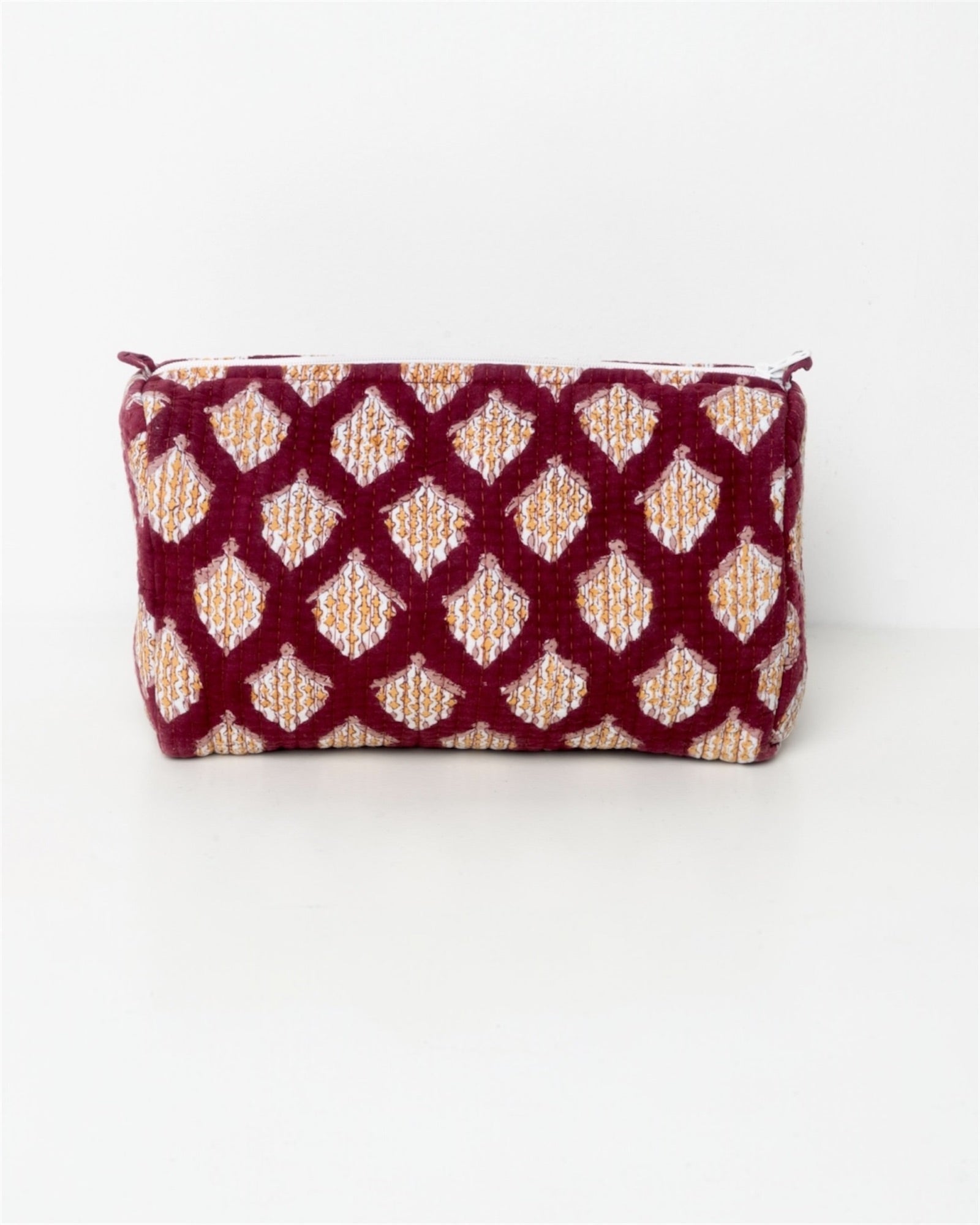 Beauty con fantasia senape su fondo prunga